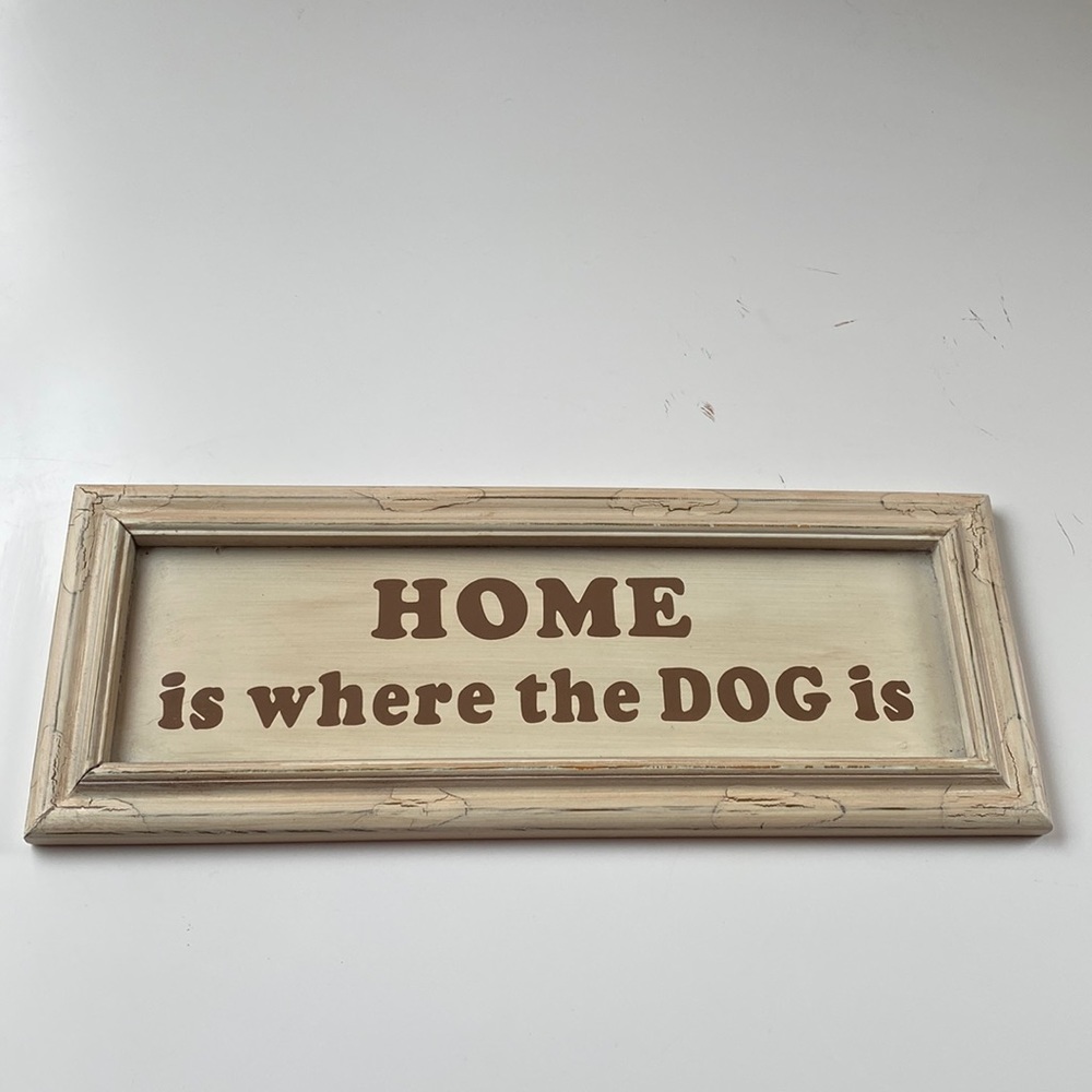 Home is where the dog is sign.